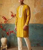 Yellow roman silk embroidered kurta with cream pajama     elegant party wear look