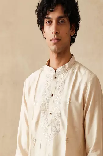 Cream silk embroidered kurta with cream pajama     elegant party wear look