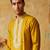 Yellow roman silk embroidered kurta with cream pajama     elegant party wear look