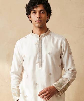 White silk embroidered kurta with cream pajama     elegant party wear look 2
