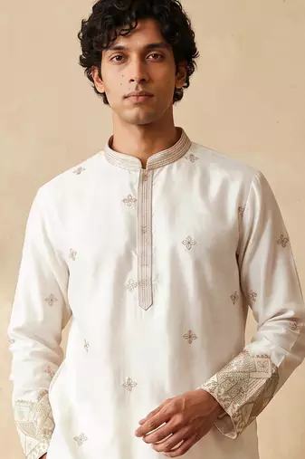 White silk embroidered kurta with cream pajama     elegant party wear look