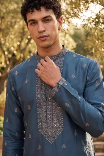 Rama blue roman silk embroidered kurta with cream pajama     elegant party wear look