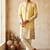 Light yellow colour silk kurta with cream cotton pajama