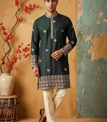 Green colour silk kurta with cream cotton pajama