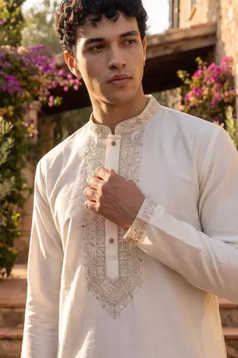 White cotton embroidered kurta with cream pajama     elegant party wear look