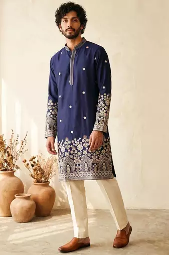 Navy blue colour silk kurta with cream cotton pajama