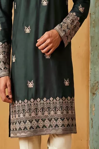 Green colour silk kurta with cream cotton pajama