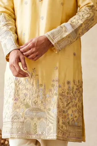 Light yellow colour silk kurta with cream cotton pajama