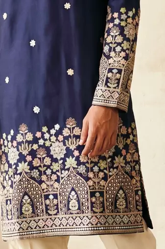 Navy blue colour silk kurta with cream cotton pajama
