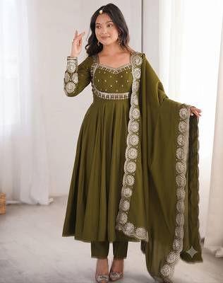 Green heavy embroidered flared anarkali suit with pant and dupatta set 1
