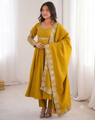 Yellow heavy embroidered flared anarkali suit with pant and dupatta set 1