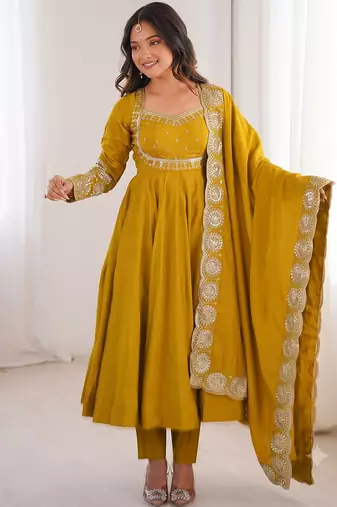 Yellow heavy embroidered flared anarkali suit with pant and dupatta set