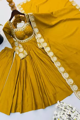 Yellow heavy embroidered flared anarkali suit with pant and dupatta set