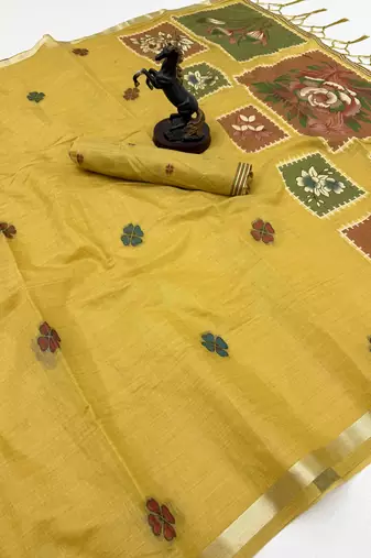 yellow floral muga cotton blend jamdani saree with blouse