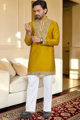 Yellow solid silk men kurta with handwork embroidered neck