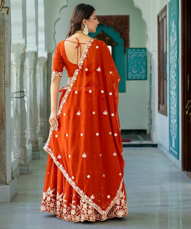 Elegant Rust Embroidered Lehenga Choli