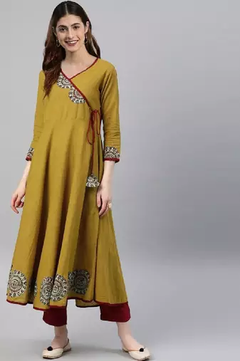 Women mustard yellow floral printed angrakha anarkali kurta with tassel tie-up