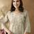 Cream-coloured ethnic motifs embroidered round neck thread work chanderi silk kurta
