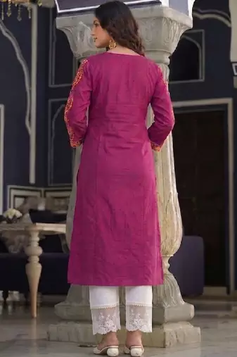 Women embroidered mirror work dobby kurta.
