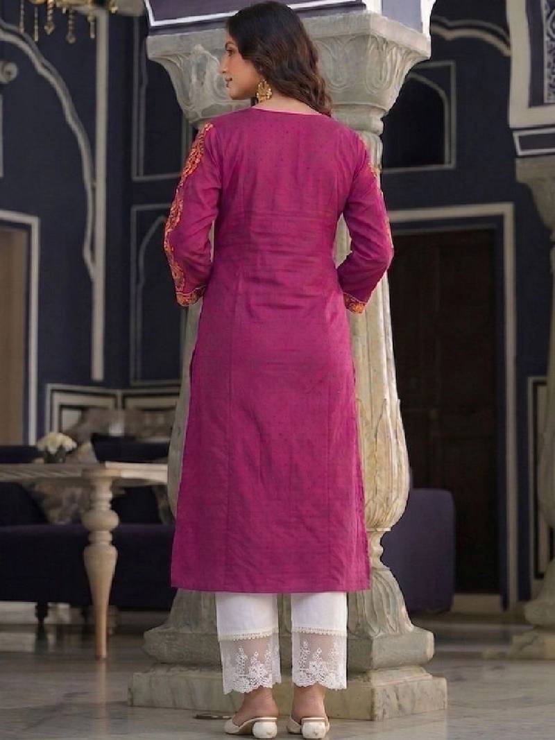Women embroidered mirror work dobby kurta.