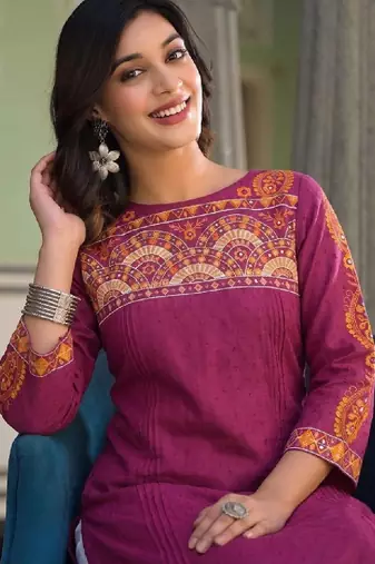Women embroidered mirror work dobby kurta.