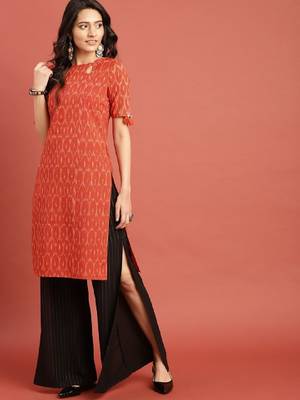 Women orange woven design ikat straight kurta with tassel detai 2