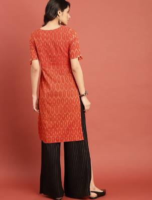 Women orange woven design ikat straight kurta with tassel detai 3