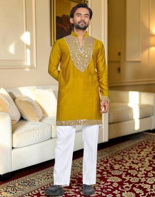 Yellow solid silk men kurta with handwork embroidered neck 1