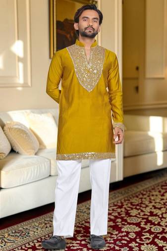 Yellow solid silk men kurta with handwork embroidered neck