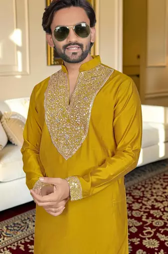 Yellow solid silk men kurta with handwork embroidered neck