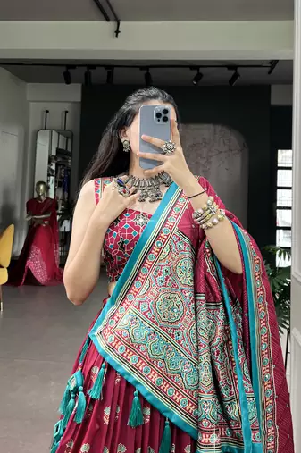 Women's Tussar Silk Ajrakh Print Lehenga Choli with Mirror Work and Dupatta for Navratri Garba Wear