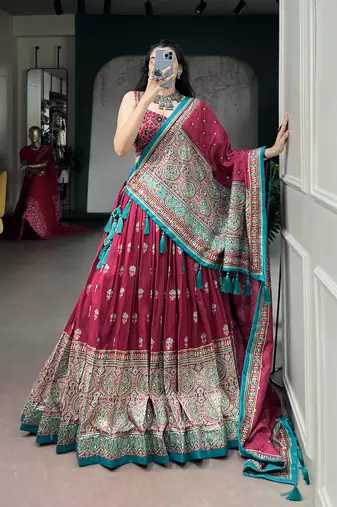 Women's Tussar Silk Ajrakh Print Lehenga Choli with Mirror Work and Dupatta for Navratri Garba Wear