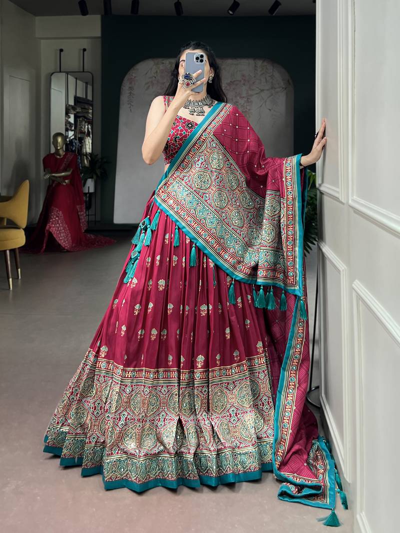 Women's Tussar Silk Ajrakh Print Lehenga Choli with Mirror Work and Dupatta for Navratri Garba Wear