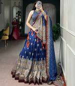 Women's Tussar Silk Ajrakh Print Lehenga Choli with Mirror Work and Dupatta for Navratri Garba Wear