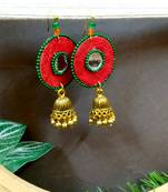 red fabric with jhumkas