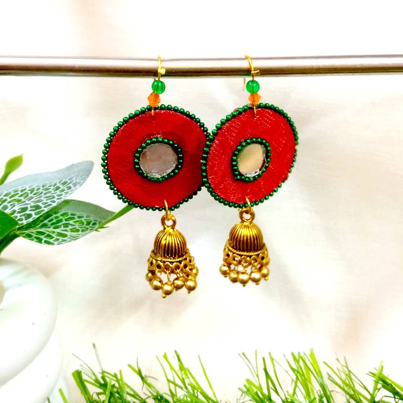 red fabric with jhumkas