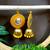Yellow fabric with jhumkas