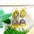 Yellow fabric with jhumkas