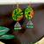 Green fabric with jhumkas
