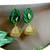 Green fabric with antique jhumkas