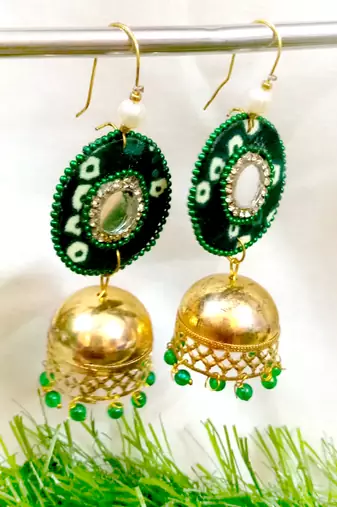 green fabric with jhumkas