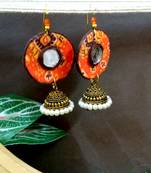Orange fabric with jhumkas