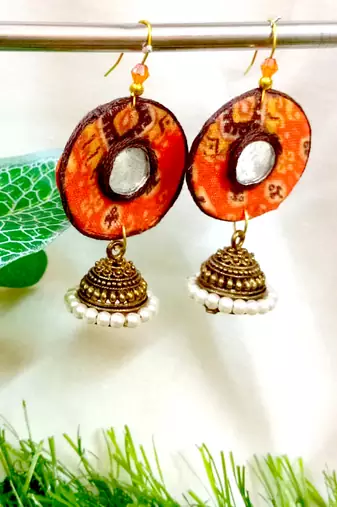 Orange fabric with jhumkas