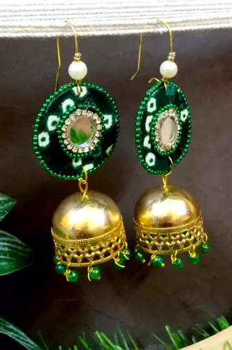 green fabric with jhumkas