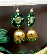 green fabric with jhumkas