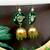 green fabric with jhumkas