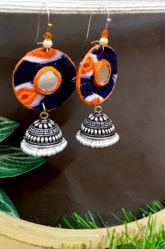 Orange fabric with jhumkas