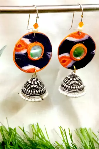 Orange fabric with jhumkas