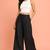 Black cotton pleated wide-leg trousers for women