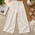Beige cotton pleated wide-leg trousers for women